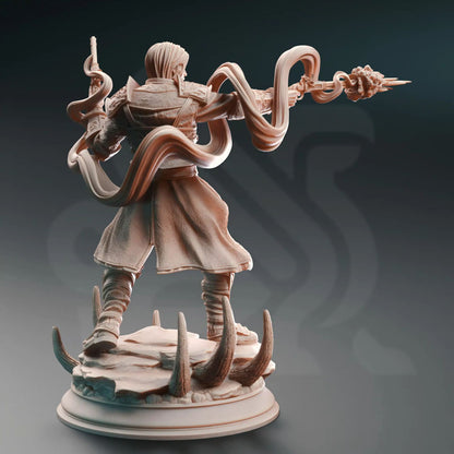 Human magic marksman miniature in shooting pose seen from the back